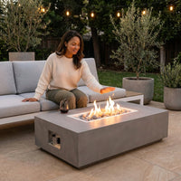 Rectangular Fire Pit Table Designed for Outdoor Entertainment, Concrete Construction, Ceramic Spheres, Multi-Function — Lifestyle